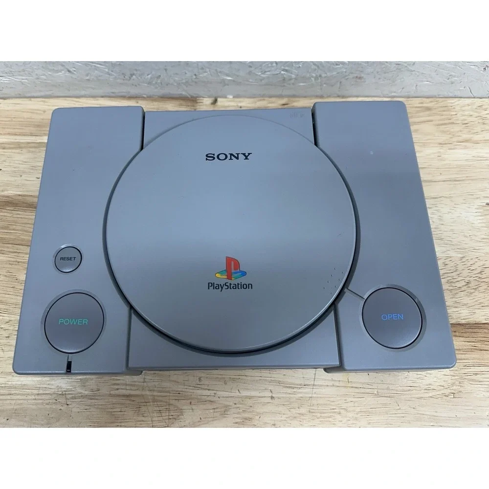 Sony PlayStation Console with DualShock Controllers Cables 4 Games SCPH-7501